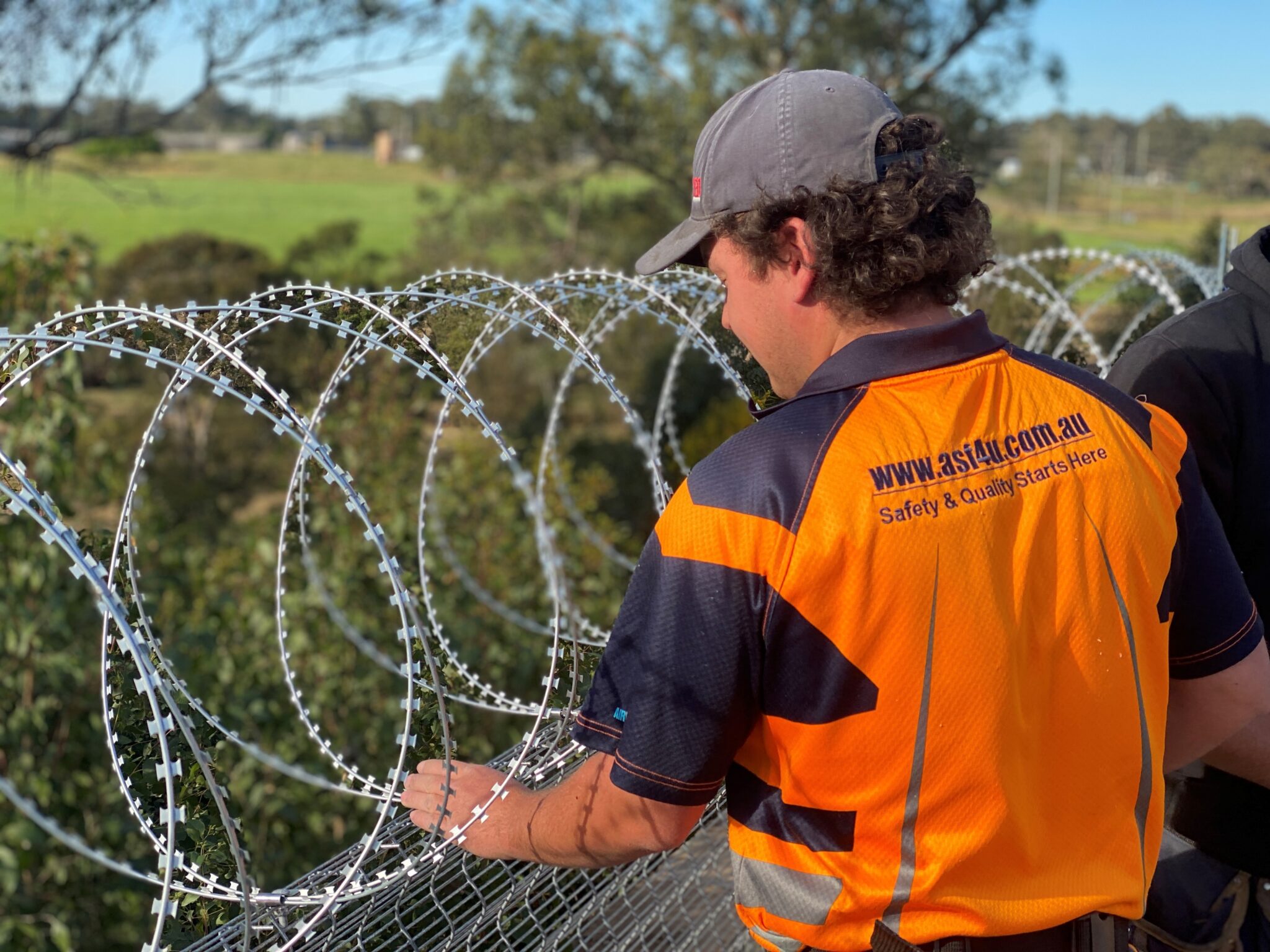 Razar Tape® Security Fencing, Barbed Tape or Razor Wire is fabricated with razor sharp steel blades and installed by Australian Security Fencing